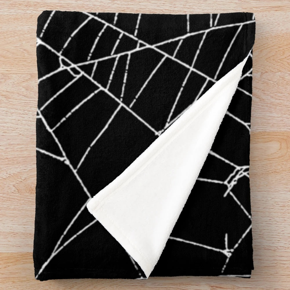 Dark and detailed spider web pattern plush blanket