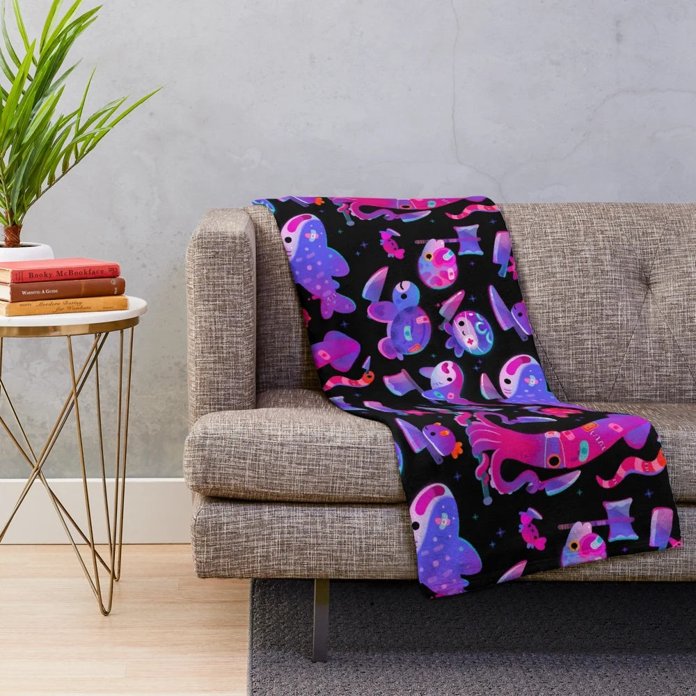Plush blanket with a variety of spooky and stabby marine life creatures