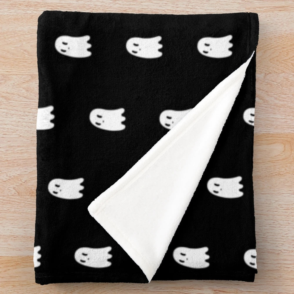 Spooky supernatural ghost plush blanket in black and white