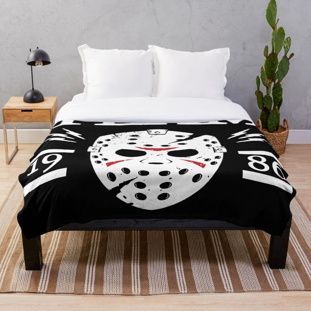Plush blanket featuring an image of the iconic horror character Jason Voorhees from the Friday the 13th movie series