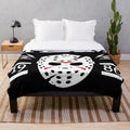 Plush blanket featuring an image of the iconic horror character Jason Voorhees from the Friday the 13th movie series