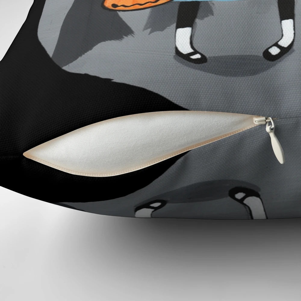 Image of a Halloween-themed pillow with two tuxedo cats in a spooky forest setting
