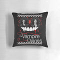 A decorative pillow featuring the iconic characters from the TV series "The Vampire Diaries