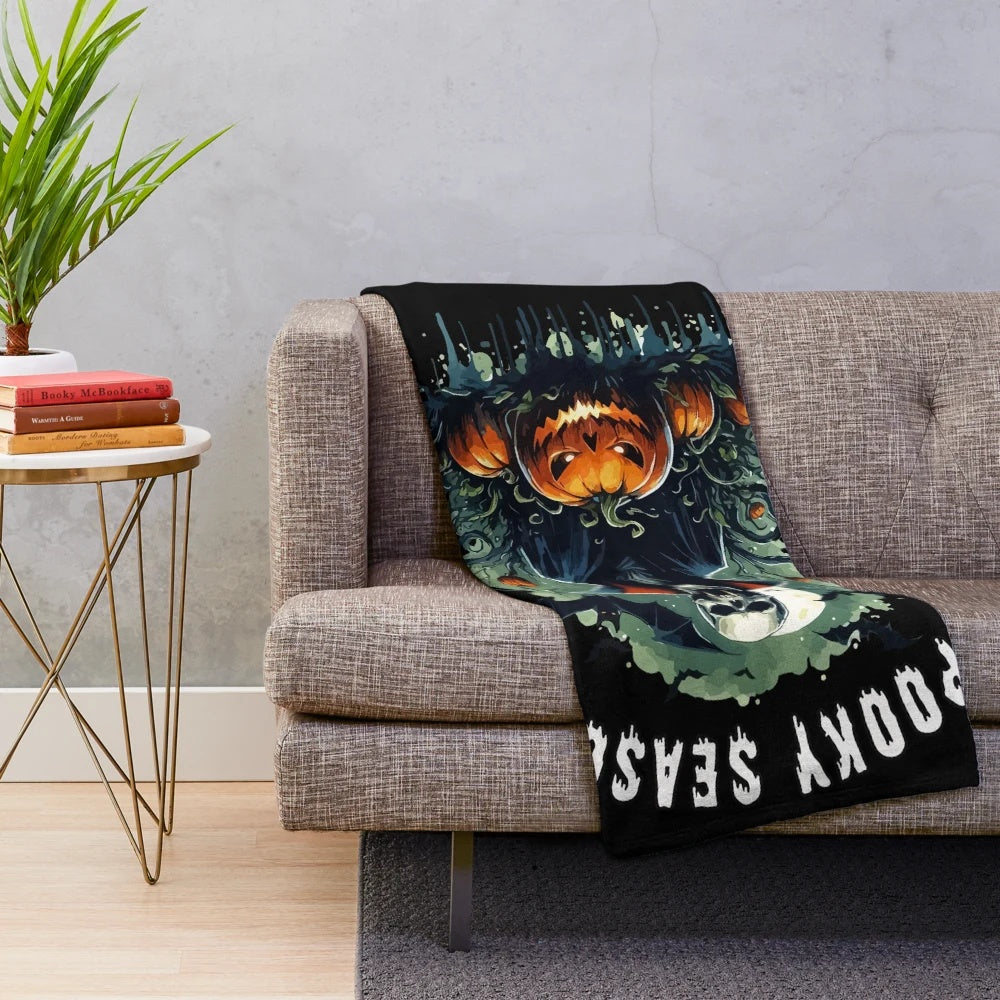 Spooky vampire Halloween plush blanket with bats, skulls, and pumpkins