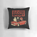 A spooky vintage-style pillow featuring a ghostly pumpkin and black cat design, perfect for Halloween decor.