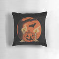 Vintage-inspired pumpkin and bat throw pillow for Halloween home decor