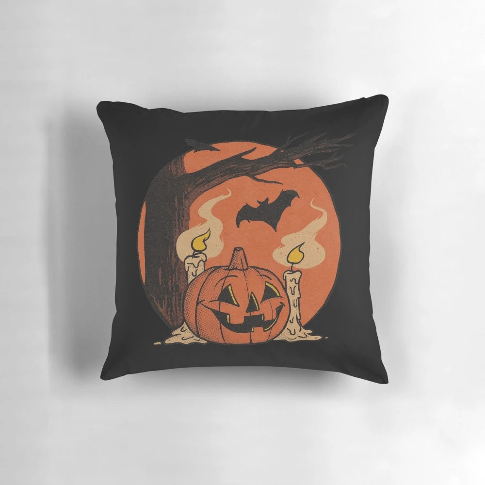 Vintage-inspired pumpkin and bat throw pillow for Halloween home decor