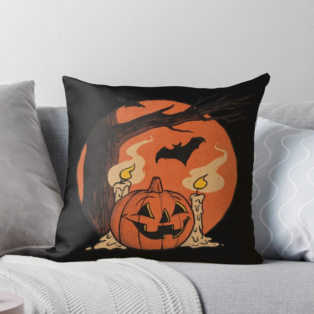 Vintage-inspired pumpkin and bat throw pillow for Halloween home decor