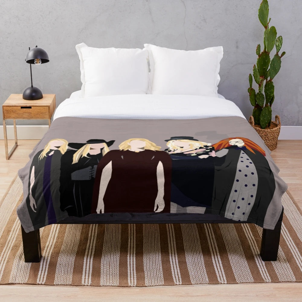 Spooky witches plush blanket featuring characters from American Horror Story
