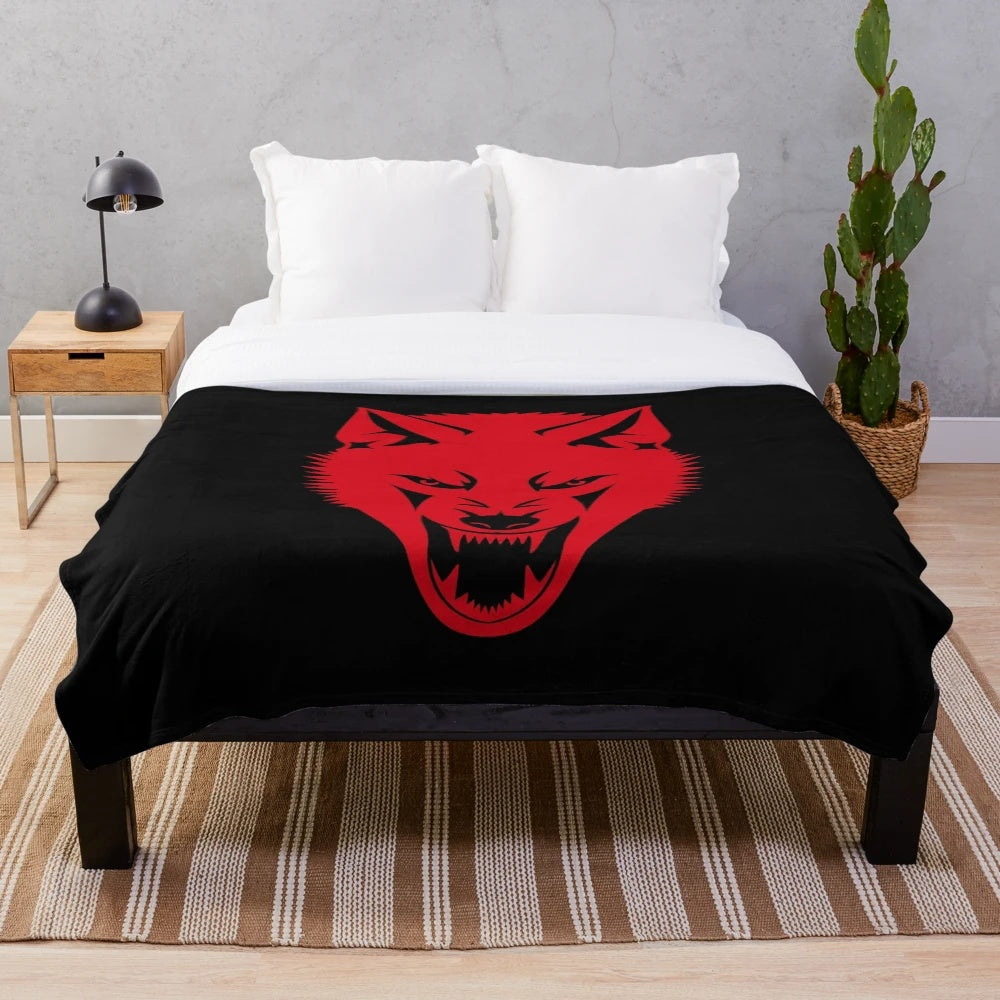 Spooky wolf plush blanket with a terrifying werewolf face design