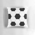 Sports cushion with a black and white soccer ball design, perfect for a man cave or sports fan's home.