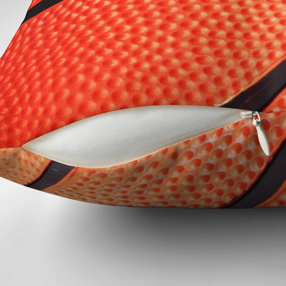 Basketball-themed pillow with orange basketball graphic