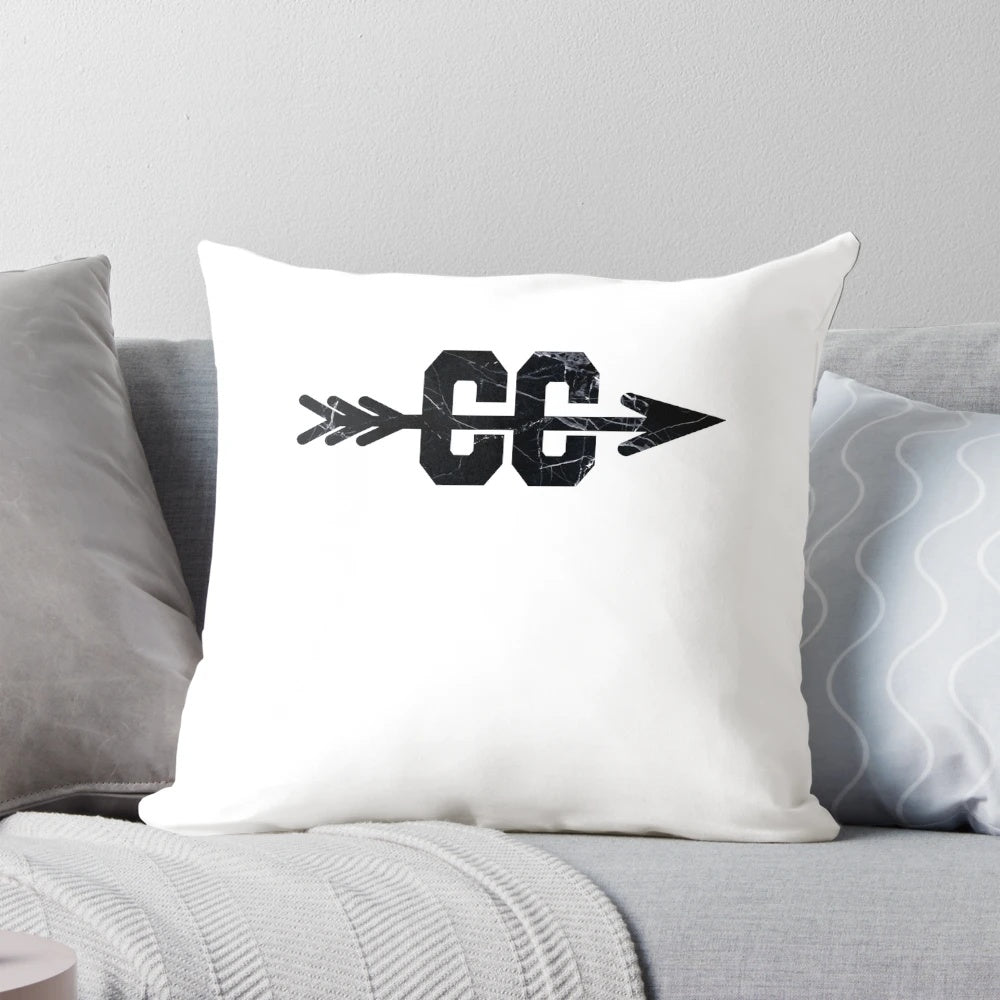 A stylish marble-patterned pillow featuring a crossed-flag cross country logo, perfect for runners and sports enthusiasts.