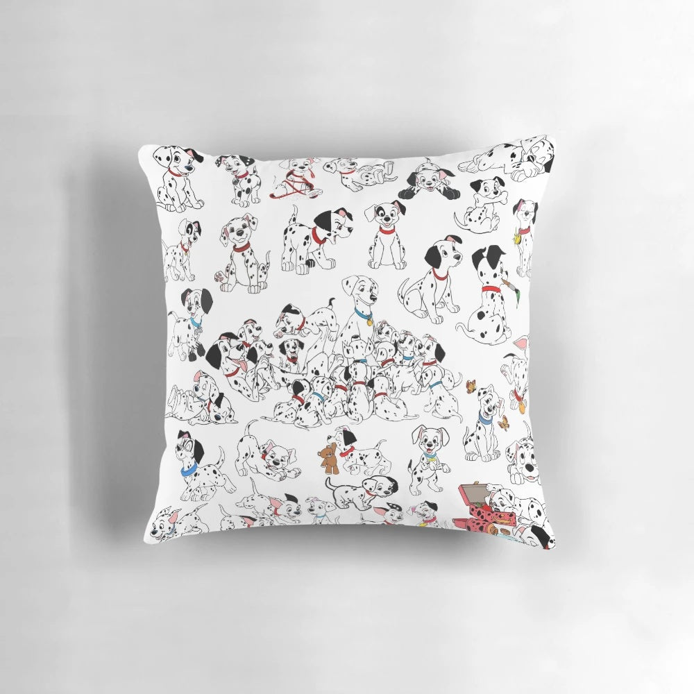A collage of spotted dalmatian puppies on a decorative throw pillow