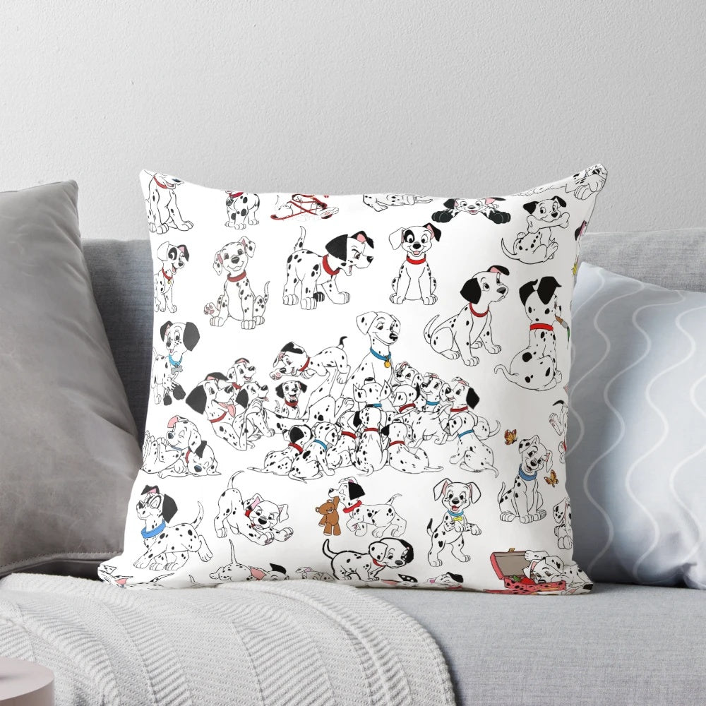 A collage of spotted dalmatian puppies on a decorative throw pillow
