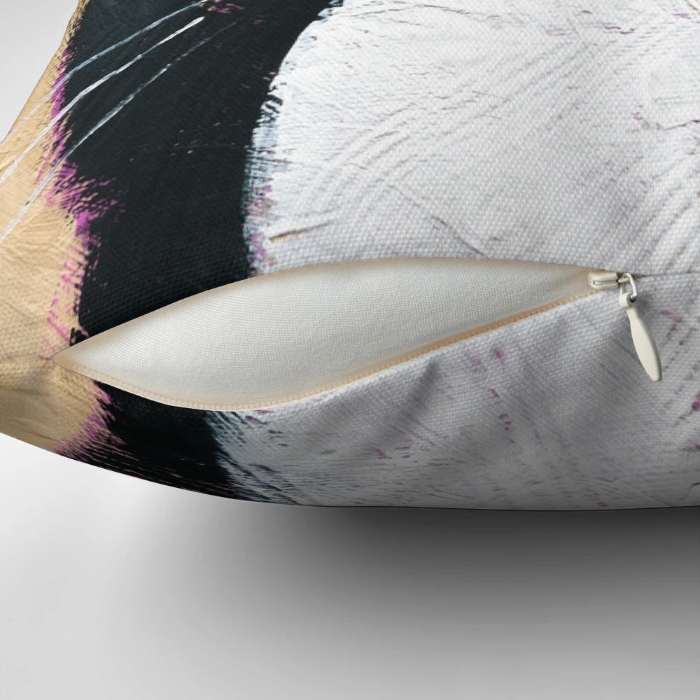Tuxedo cat wearing a flower crown on a decorative pillow