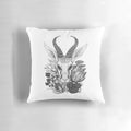 A black and white throw pillow featuring the silhouette of a springbok antelope surrounded by fynbos flowers, perfect for South African-inspired home decor.