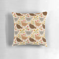 A decorative pillow featuring a whimsical pattern of springtime chickens and flowers.