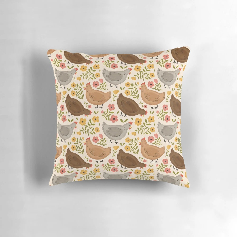 A decorative pillow featuring a whimsical pattern of springtime chickens and flowers.