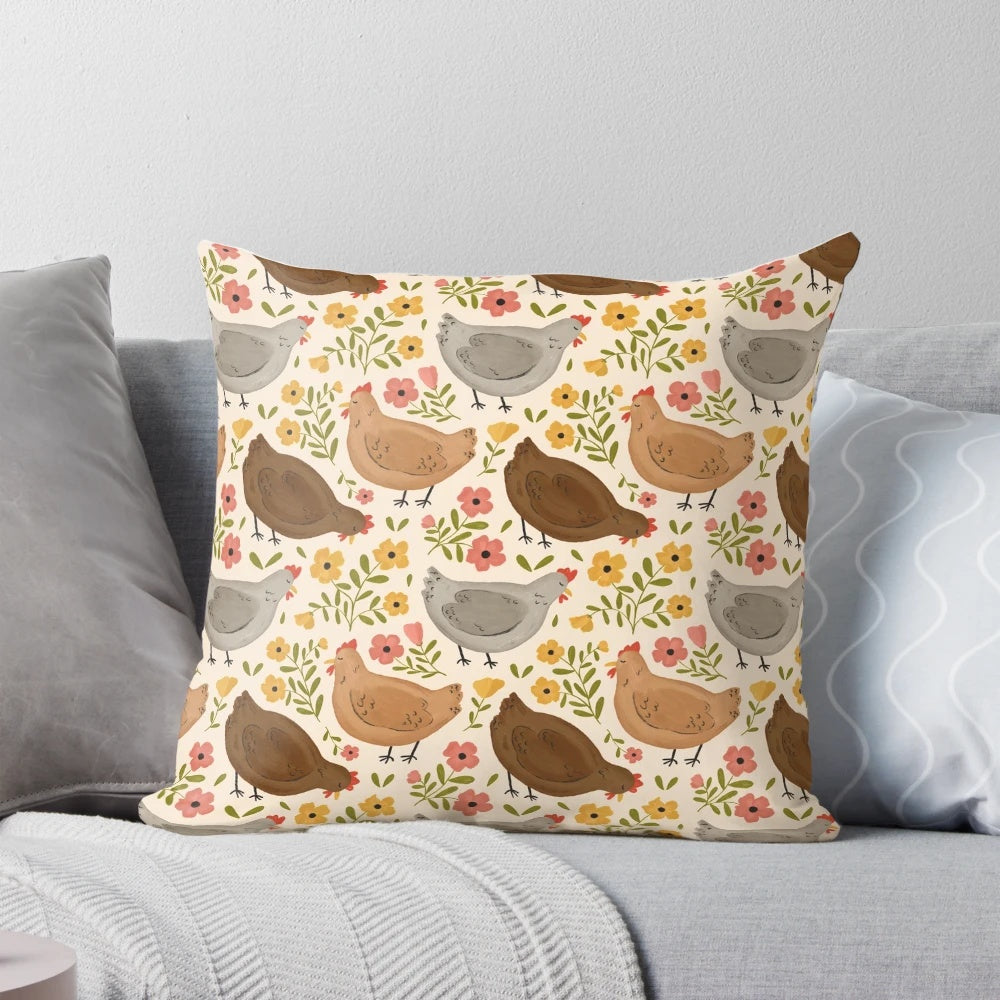 A decorative pillow featuring a whimsical pattern of springtime chickens and flowers.