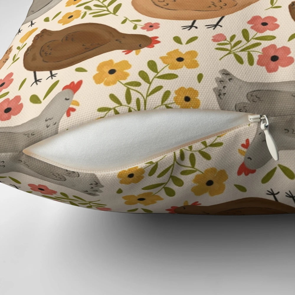 A decorative pillow featuring a whimsical pattern of springtime chickens and flowers.