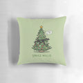 Spruce Willis" Christmas-themed pillow featuring a pun on the actor Bruce Willis