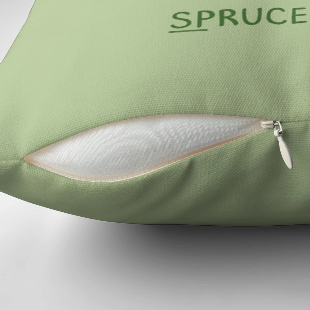 Spruce Willis" Christmas-themed pillow featuring a pun on the actor Bruce Willis