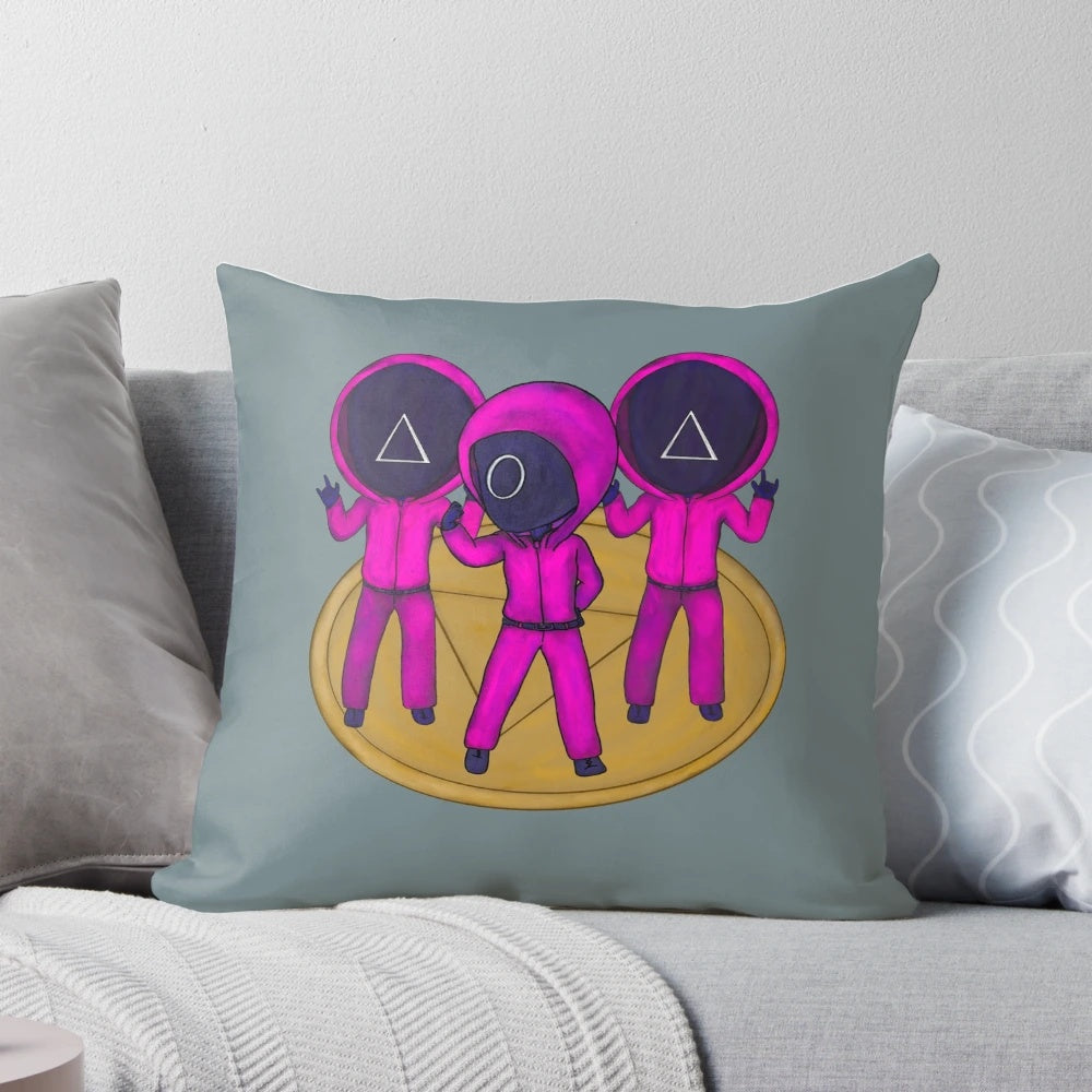 Squid Game inspired boyband-themed decorative pillow featuring pink soldiers, masked men, and dalgona cookies