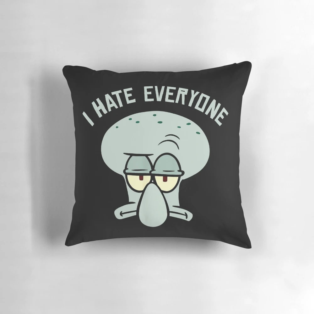 A cozy and humorous Squidward-themed pillow featuring the iconic "I Hate Everyone" quote from Spongebob Squarepants.
