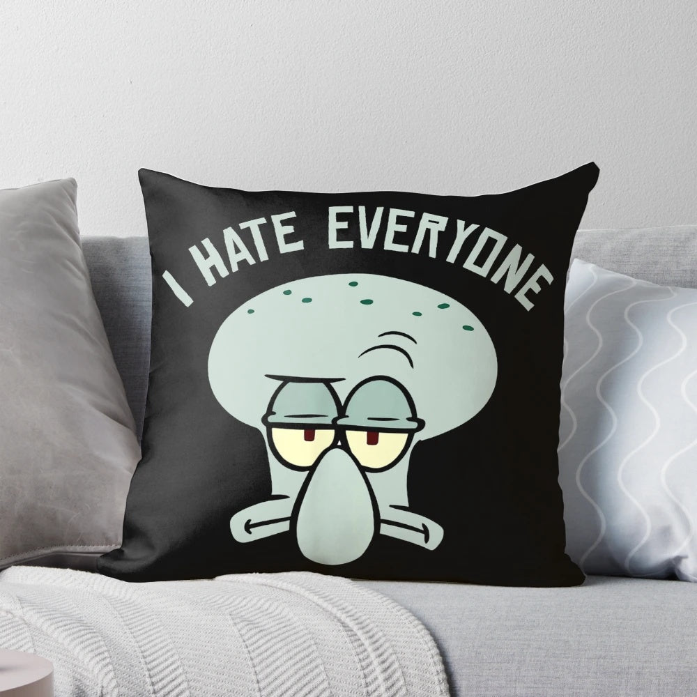 A cozy and humorous Squidward-themed pillow featuring the iconic "I Hate Everyone" quote from Spongebob Squarepants.