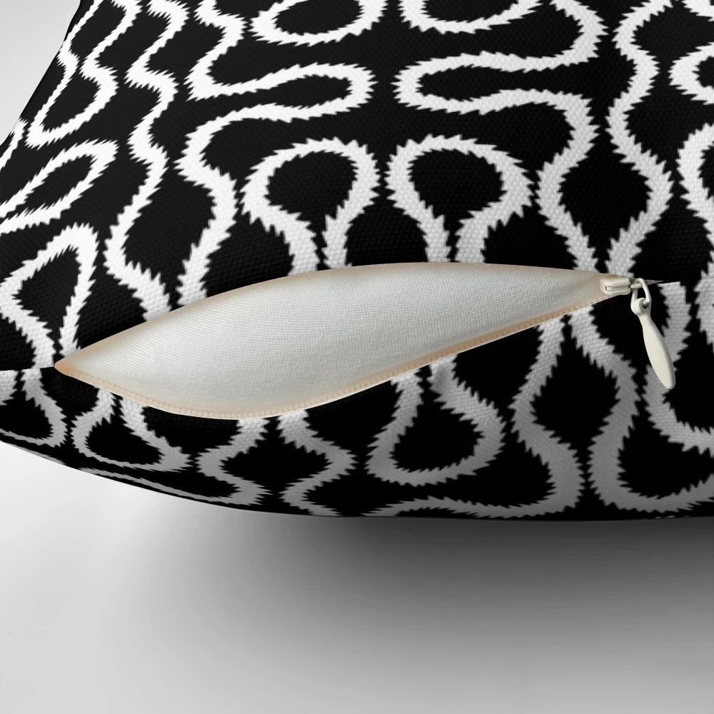 Squiggles art black and white decorative pillow with a unique modern design