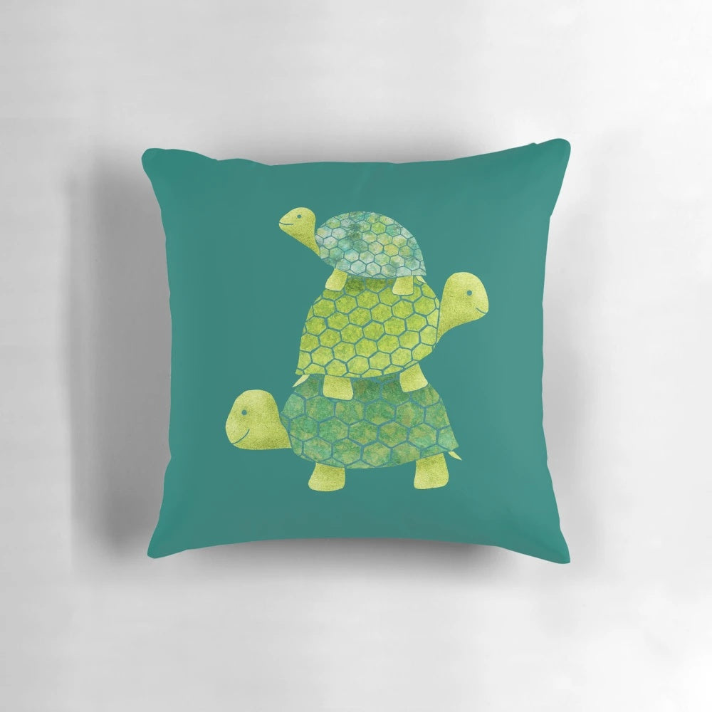 Cute stacked turtle plush pillow in teal, lime green, and turquoise colors