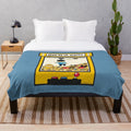 A plush blanket featuring the "Beam Me Up, Scotty" quote and Star Trek characters