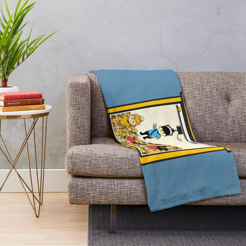 A plush blanket featuring the "Beam Me Up, Scotty" quote and Star Trek characters