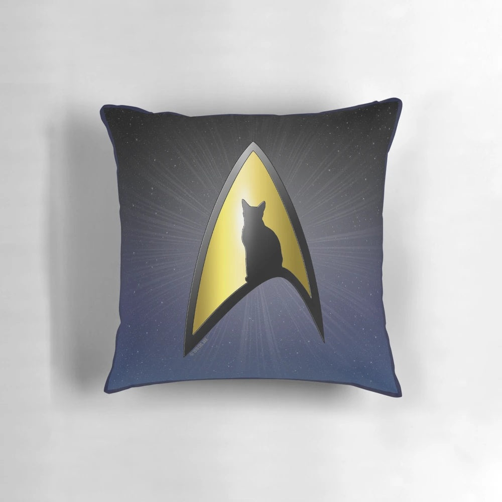 Starfleet cat silhouette design on a black and gold decorative pillow