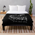 Starman-inspired plush blanket featuring an astral design