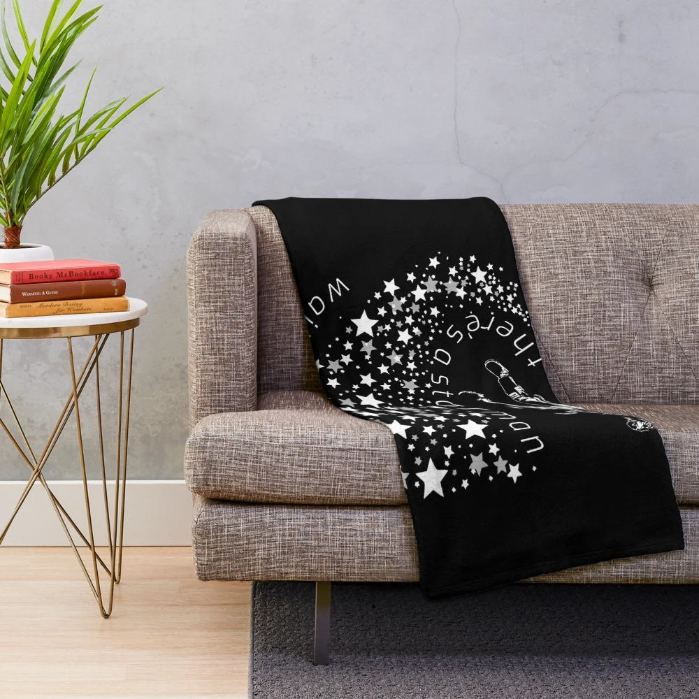 Starman-inspired plush blanket featuring an astral design