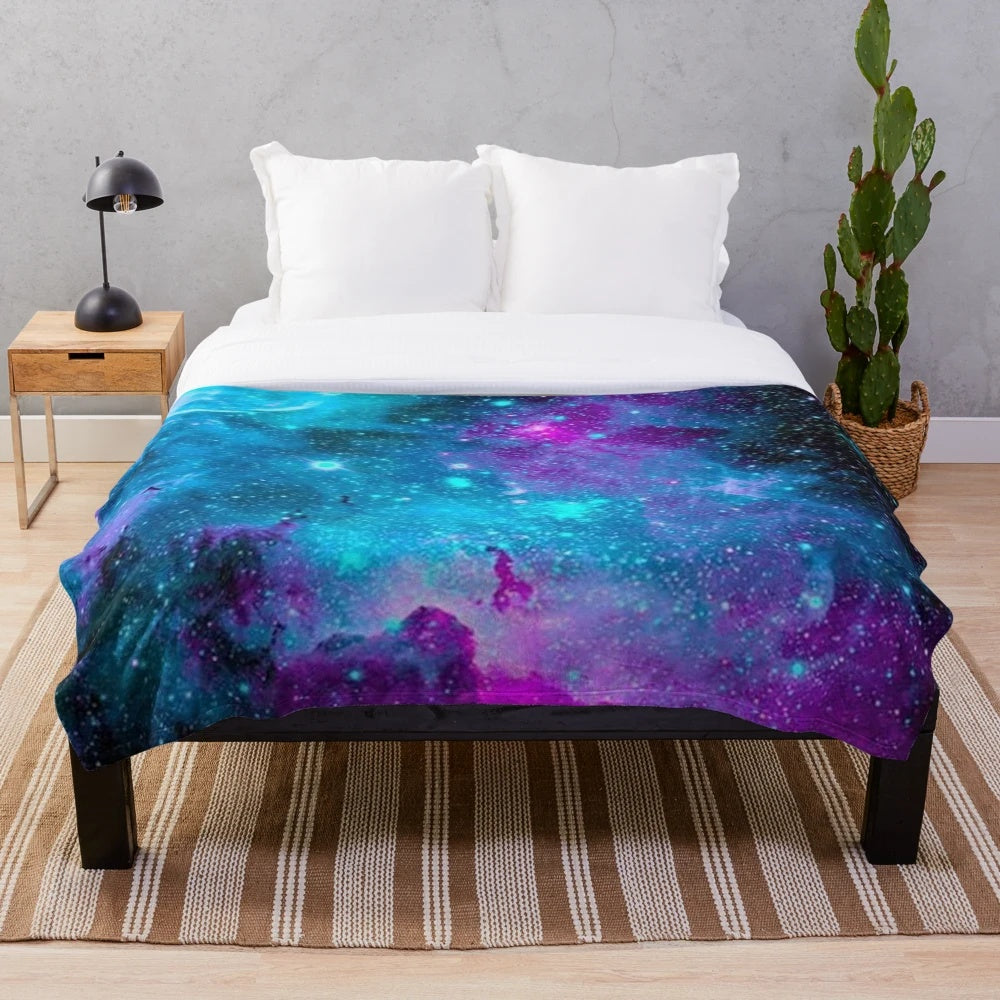 Starry galaxy plush blanket with purple, blue and cosmic design