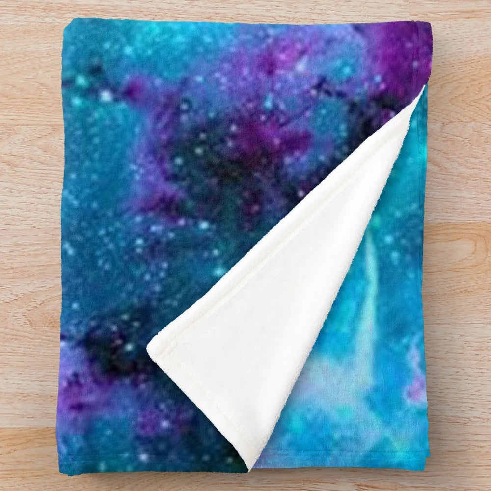Starry galaxy plush blanket with purple, blue and cosmic design