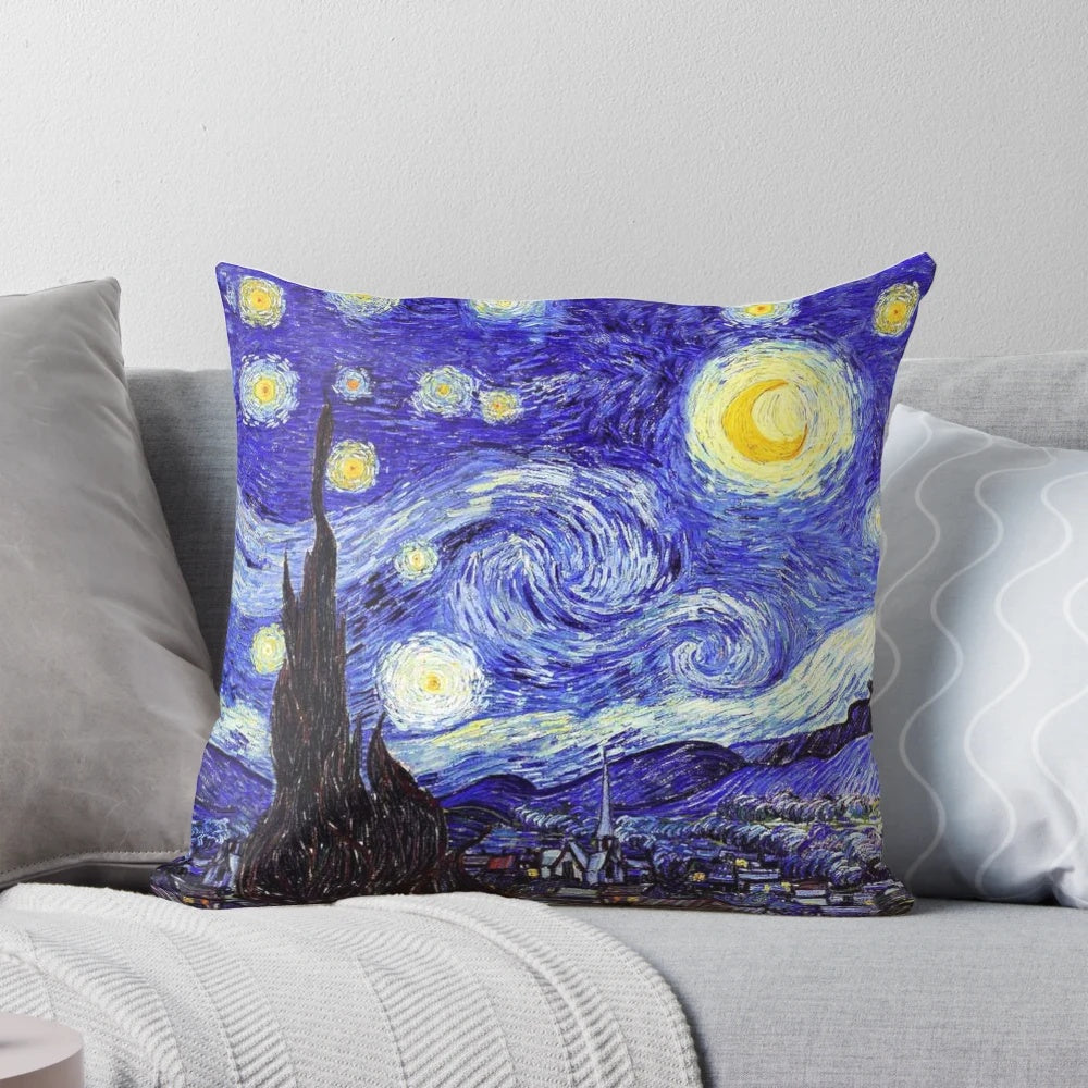 A decorative pillow featuring a design inspired by Van Gogh's "The Starry Night" painting, with a mountain landscape and night sky.