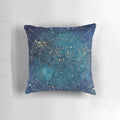 A decorative pillow featuring a detailed star map design of the night sky