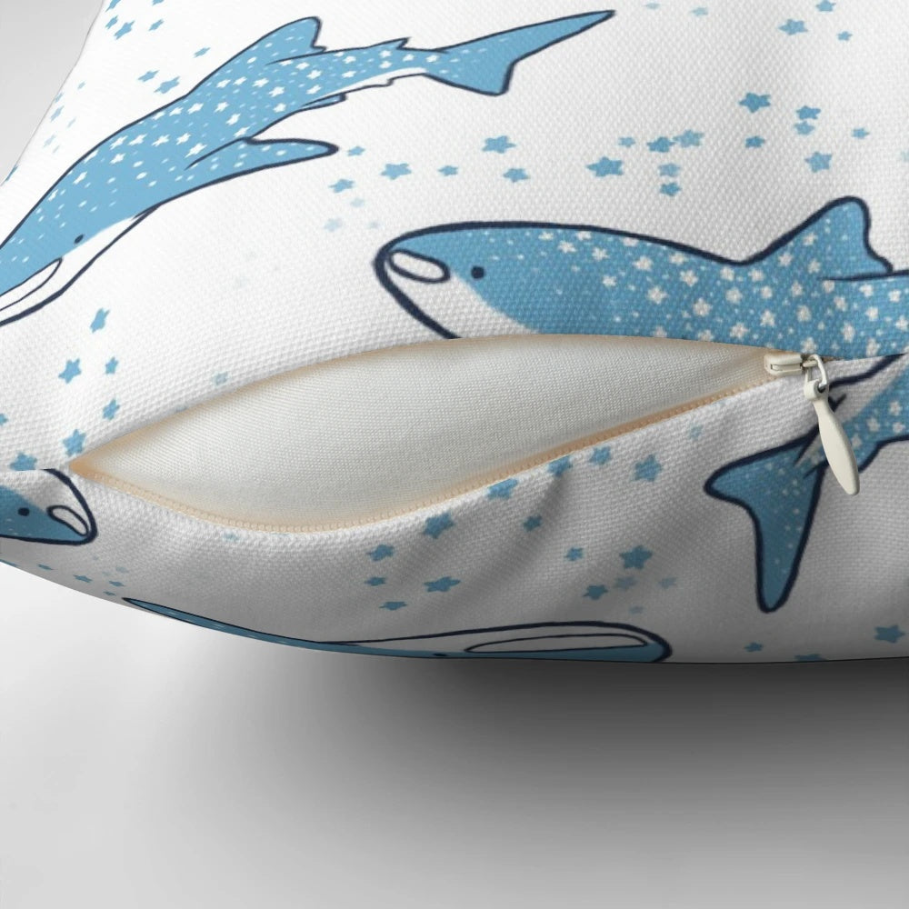 A decorative throw pillow featuring a cute cartoon whale shark swimming against a starry night sky background