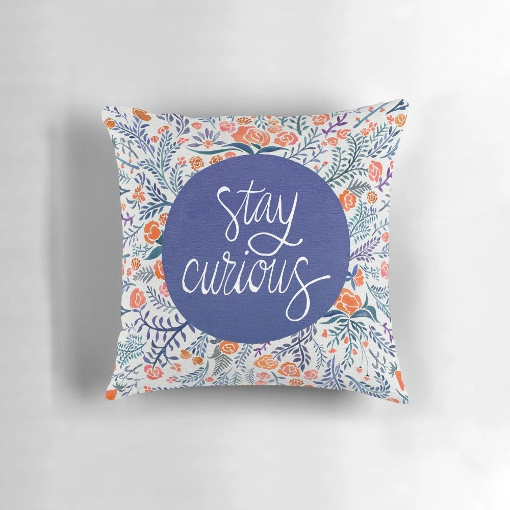 Navy and coral floral watercolor 'Stay Curious' throw pillow