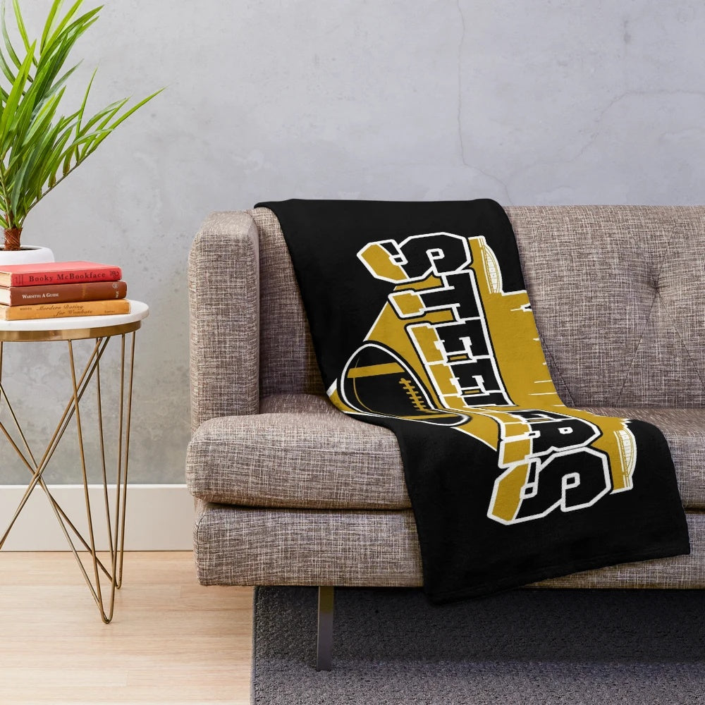 Plush football team blanket featuring the Pittsburgh Steelers skyline design