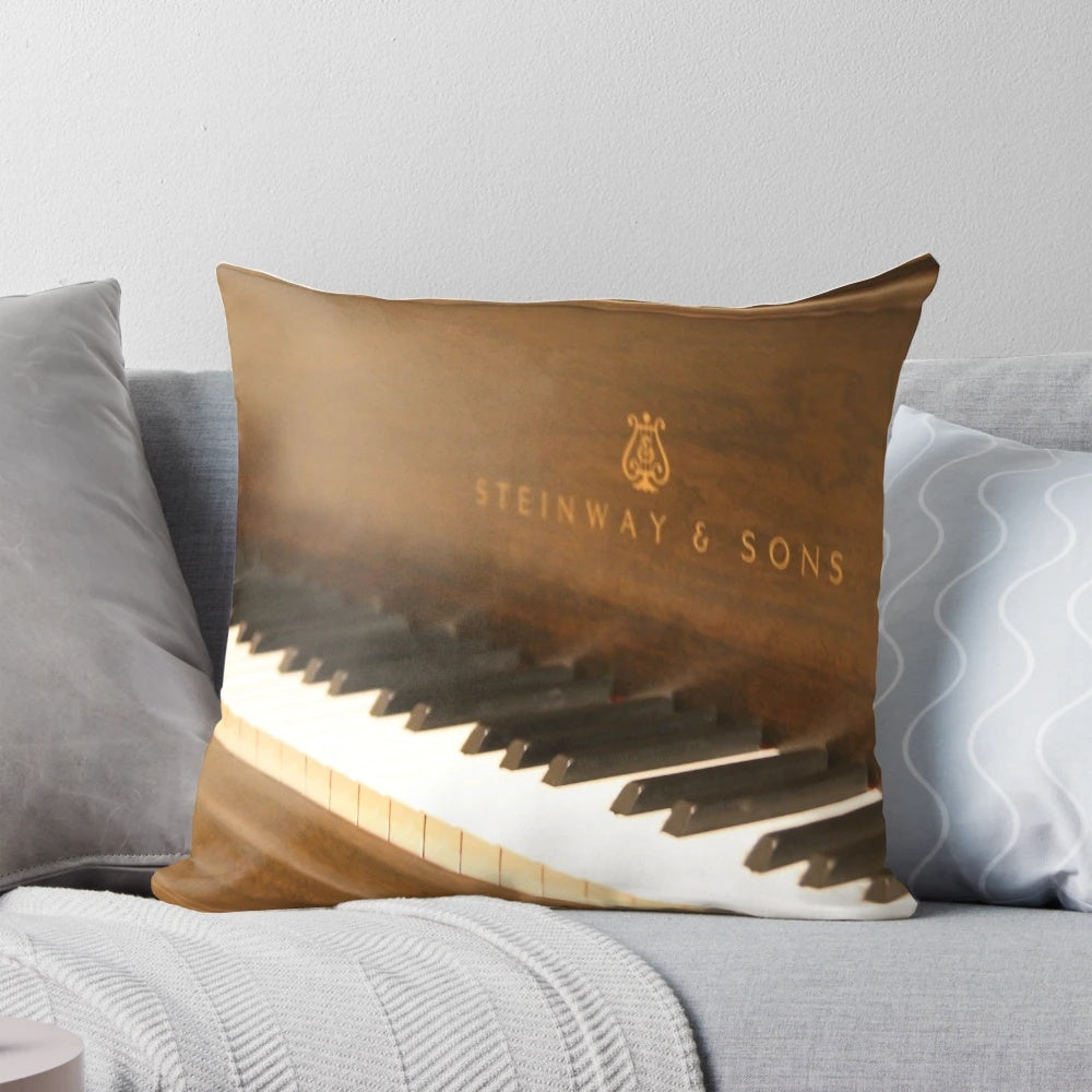 Steinway piano-themed decorative pillow with reflective surface