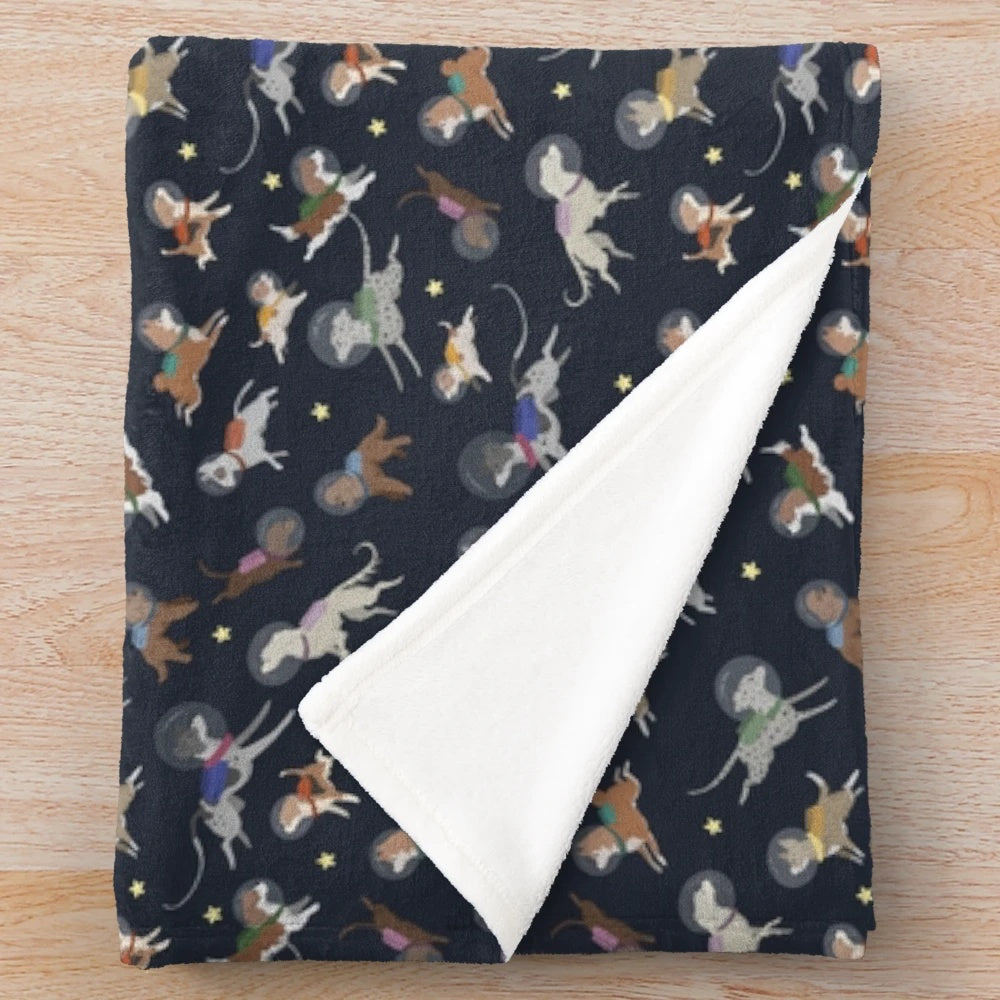 Space-themed plush blanket featuring different dog breeds against a galaxy background