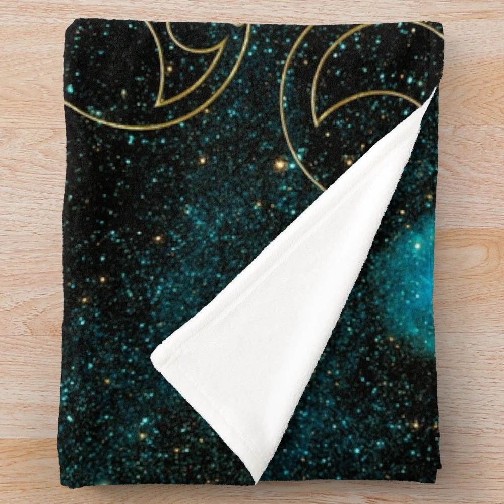 Plush blanket with time lord words in gold on a teal stellar background