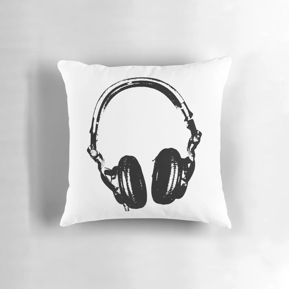 Stylish stencil-inspired pillow with black and white DJ headphones graphic