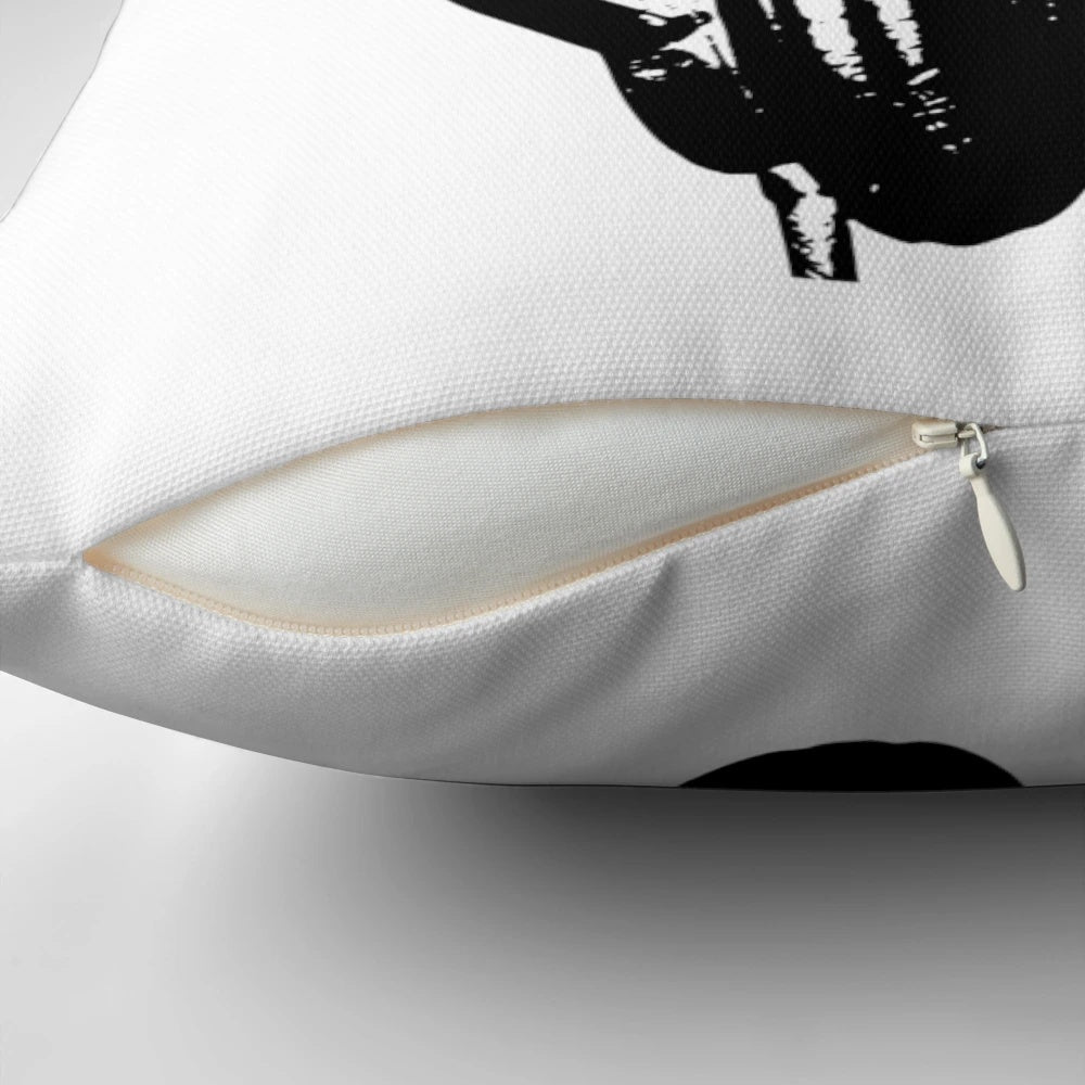 Stylish stencil-inspired pillow with black and white DJ headphones graphic