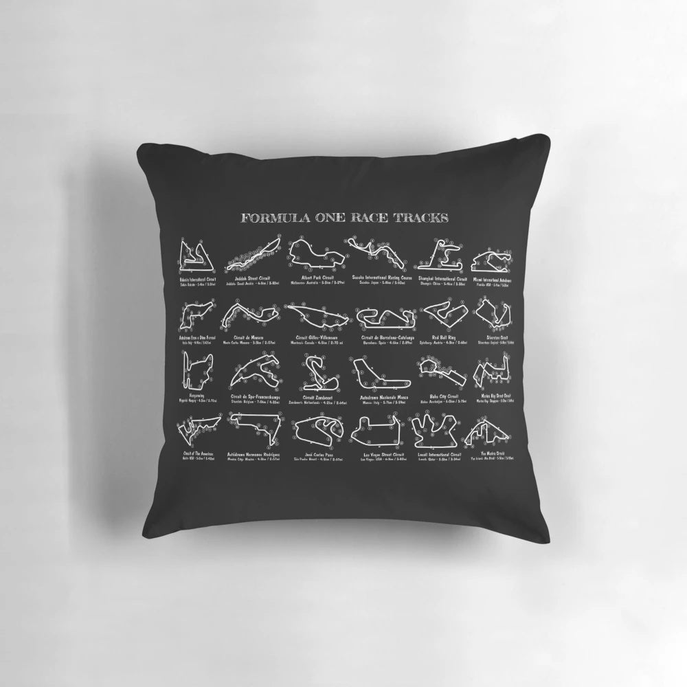 White stencil-style graphic of an F1 race track printed on a throw pillow.